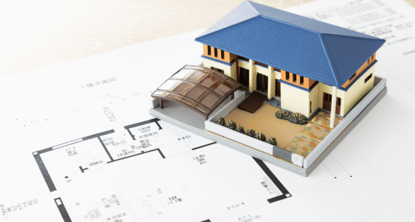 Architectural house model on a floor plan