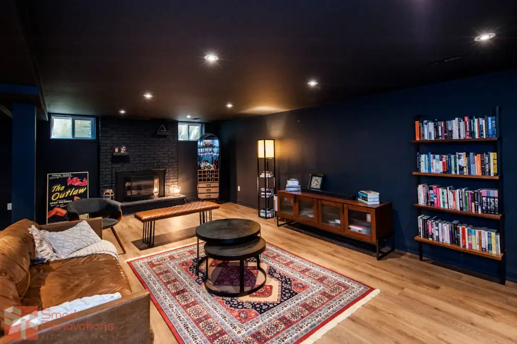 Basement remodel cost example: finished daylight basement in Bellevue with fireplace and built-ins