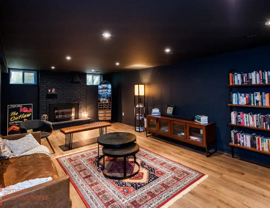 Basement remodel cost example: finished daylight basement in Bellevue with fireplace and built-ins